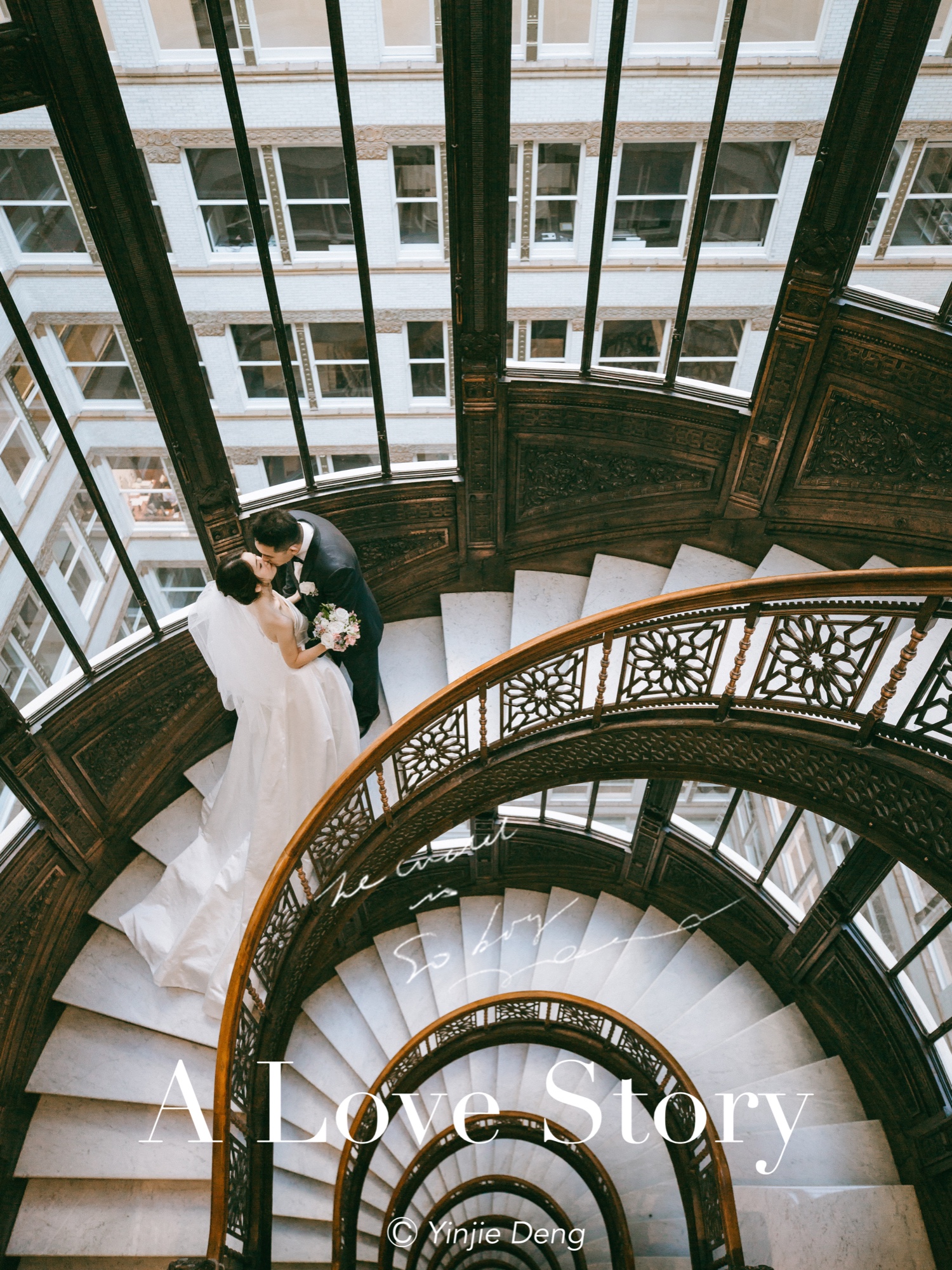 Newlyweds on an ornate spiral staircase
